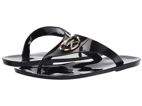 black and white michael kors flip flops|Michael Kors jelly sandals black.